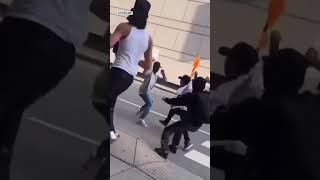 Wild KNIFE FIGHT in Chicago between several men near Magnificent Mile