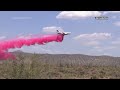 Air tankers and helicopters attack Arizona wildfire that has forced evacuations near Phoenix  - 00:56 min - News - Video