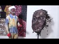 Nigerian sculptor turns roots into art to preserve cultural identity | REUTERS