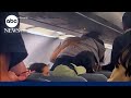 Fight on Frontier Airlines plane caught on camera