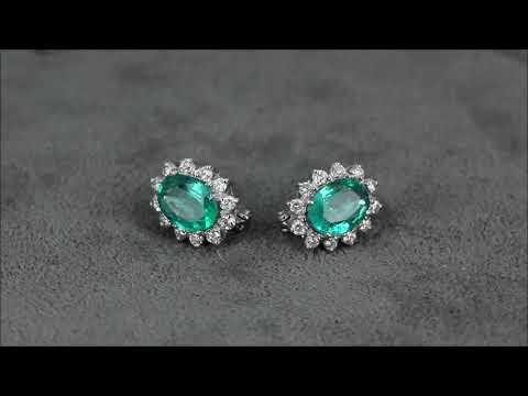 Серьги из белого золота с изумрудом и бриллиантами S-12