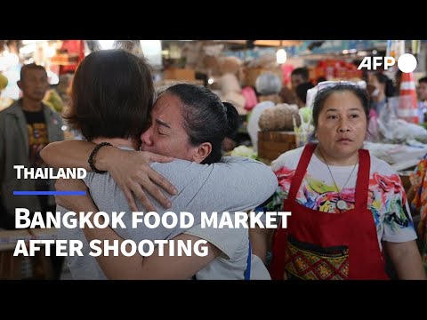 Five security guards killed by gunman in Thai market | AFP