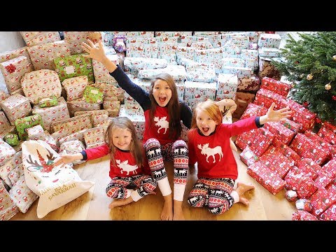 CHRISTMAS MORNING OPENING PRESENTS - MEGA SHOCK REACTION! VLOGMAS DAY 26!