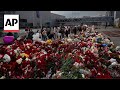 People continue to place flowers at memorial to victims of Moscow attack