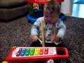 Baby Matt plays the xylophone