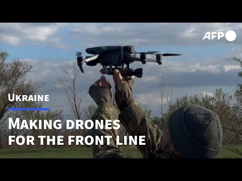 Ukrainians make bomb-carrying drones for the front line | AFP