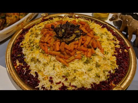 تمن جزر برياني جزر مع دجاج شوي