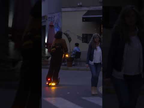 Riding an e-scooter at night - The Pure Advance in Barcelona