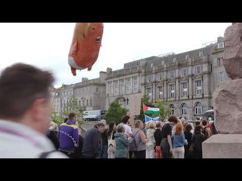 Hundreds in Aberdeen gather to protest visit of US President Donald Trump | AFP