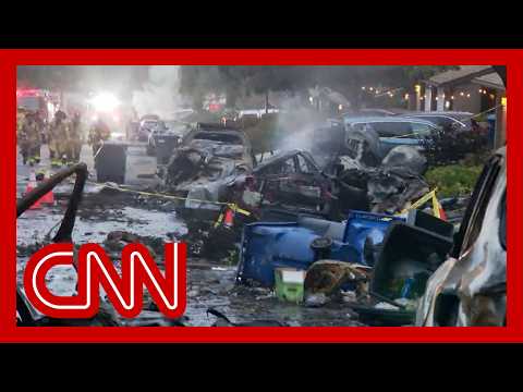 Business jet crashes into San Diego neighborhood, setting homes and cars on fire