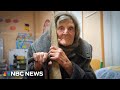 98-year-old Ukrainian woman walks miles in her slippers to escape fighting