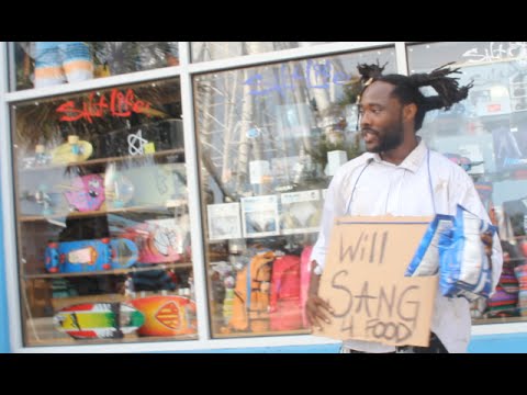 Homeless man sings John Legend's
