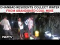 Dhanbad News | Dhanbad Residents Collect Water From An Abandoned Coal Mine For Their Daily Needs