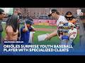 Orioles, UA surprise youth baseball player with custom cleats