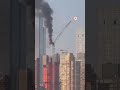 Crane crashes into street during New York rush hour