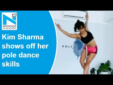 Kim Sharma shows off her pole dance skills, Yuvraj Singh drops a comment Kim Sharma shows off her pole dance skills, Yuvraj Singh drops a comment
