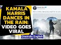 US Democratic vice-presidential nominee Kamala Harris dances in the rain