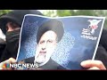 Huge crowds attend funeral event for Iranian president