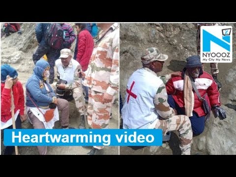 Heartwarming!! ITBP personnel create human wall to protect Amarnath devotees