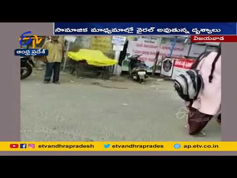 Students fight and drag each other with hair at KBN college outside in Vijayawada