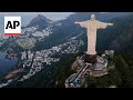 Christ the Redeemer decorated with colorful carpet to celebrate Corpus Christi