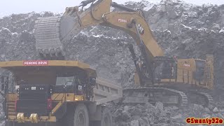 4K| CAT 6015 Loading Two CAT 777Gs In A Quarry
