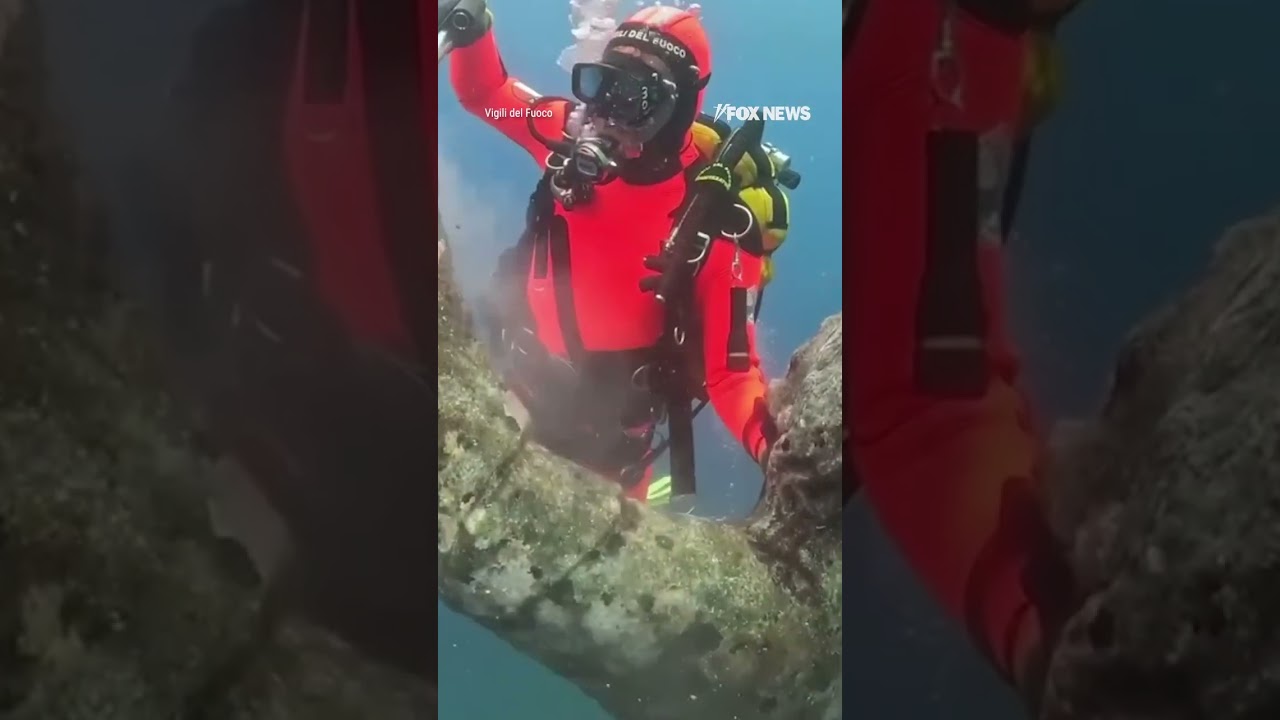 WATCH: Divers restore Christ of the Abyss statue #shorts