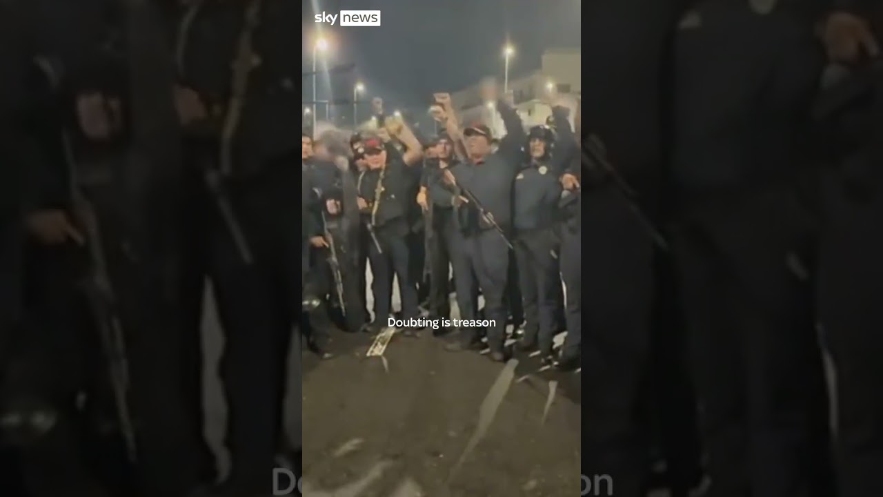 Armed men in Venezuela chant in allegiance to Maduro