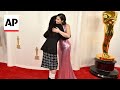 Billie Eilish and America Ferrera hug on the Oscars red carpet