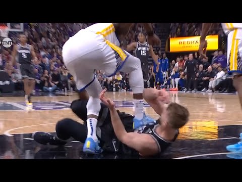 Draymond Green ejected for stepping on Domantas Sabonis after he grabbed his leg