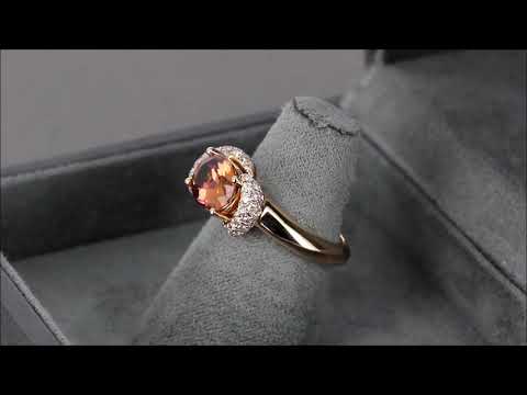 Женское золотое кольцо с танзанитом и розовыми бриллиантами