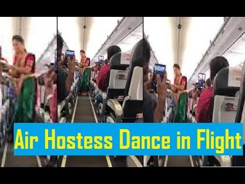 Air hostesses perform Bathukamma dance in flight Air hostesses perform Bathukamma dance in flight