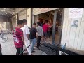 Desperate Palestinians line up for bread in Gaza City amid famine warning  - 01:21 min - News - Video