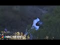 Video shows rescue of woman who was trapped in car down California cliff