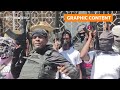 GRAPHIC WARNING: Violence surges as Haiti gang leader aims to unseat PM | REUTERS