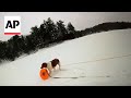 Moment Michigan mans dog helps rescue him from icy lake