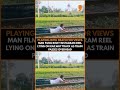 Man Lies on Railway Tracks for Instagram Reel | Viral Stunt Sparks Outrage | News9  - 00:34 min - News - Video