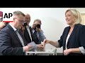 French far-right leader Marine Le Pen votes in European election