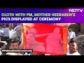 PM Modi Oath Ceremony | Cloth With PM Modi, Mother Heerabens Pics Displayed At Oath Ceremony