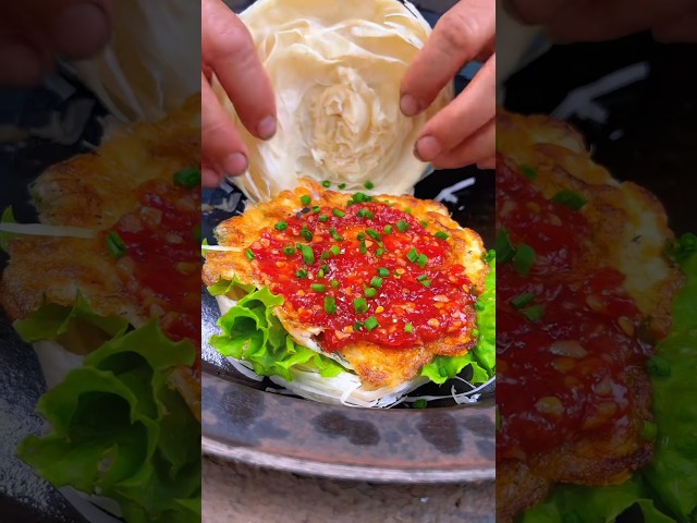 Chinese burger Fried eggs outdoors