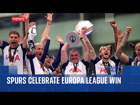 Tottenham celebrate European title as fans welcome the team home
