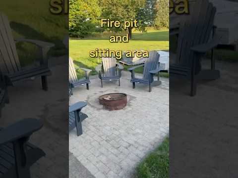 Patio sitting area and bonfire 🔥 a nice campfire ￼￼