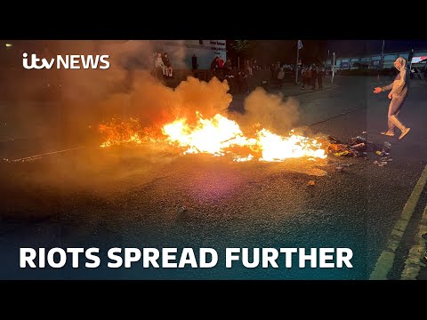 Police attacked during third night of disorder in Ballymena | ITV News