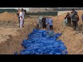 More than 100 bodies buried in Gaza mass grave