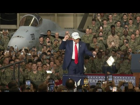 Trump performs his famous dance in front of soldiers at Yokosuka Naval Base | AFP