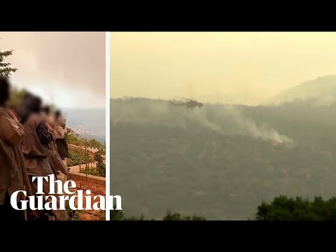 Greek police rush to evacuate convent and homes as wildfire engulfs town