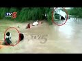 Dramatic Rescue :  Car Swept Away in Floods at Maharashtra Amaravati