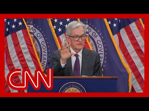 Fed holds interest rates steady despite pressure from Trump