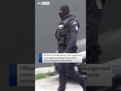 Tate brothers escorted out of house