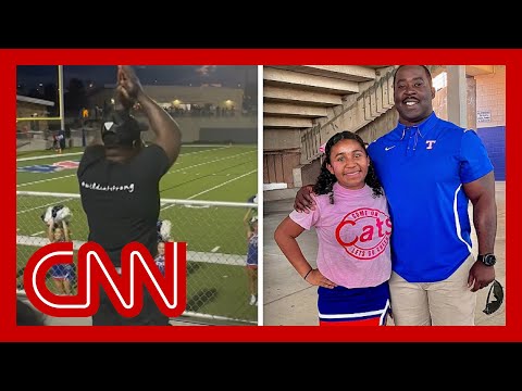 Dad's moves during daughter's cheerleading routine go viral